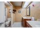 Bathroom with double vanity and access to a toilet and shower at 2781 Westchester Dr S, Clearwater, FL 33761