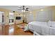Bright bedroom with private bathroom access and wood floors at 2781 Westchester Dr S, Clearwater, FL 33761