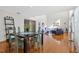 Bright dining room with hardwood floors and view to the living room at 2781 Westchester Dr S, Clearwater, FL 33761