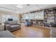 Living room with built-in bookcases and hardwood floors at 2781 Westchester Dr S, Clearwater, FL 33761