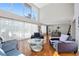 Spacious living room with hardwood floors and views to the pool at 2781 Westchester Dr S, Clearwater, FL 33761