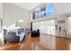 Spacious living room with hardwood floors and large windows at 2781 Westchester Dr S, Clearwater, FL 33761