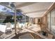 Spacious screened poolside porch with ample seating at 2781 Westchester Dr S, Clearwater, FL 33761