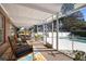 Relaxing screened porch overlooking the pool and backyard at 2781 Westchester Dr S, Clearwater, FL 33761