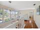 Spacious upper hallway with hardwood floors and large windows at 2781 Westchester Dr S, Clearwater, FL 33761