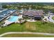 Aerial view of clubhouse, pool, and marina at 2795 Kipps Colony S Dr # 305, St Petersburg, FL 33707
