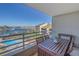 Balcony with patio table and chairs at 2795 Kipps Colony S Dr # 305, St Petersburg, FL 33707