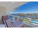 Spacious balcony with water view and patio furniture at 2795 Kipps Colony S Dr # 305, St Petersburg, FL 33707