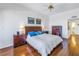 Bright bedroom with hardwood floors and water views at 2795 Kipps Colony S Dr # 305, St Petersburg, FL 33707