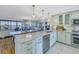 Granite countertops and stainless steel appliances highlight this kitchen at 2795 Kipps Colony S Dr # 305, St Petersburg, FL 33707