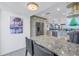Modern kitchen with stainless steel appliances and granite countertops at 2795 Kipps Colony S Dr # 305, St Petersburg, FL 33707
