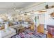 Open floor plan living area with spiral staircase at 2795 Kipps Colony S Dr # 305, St Petersburg, FL 33707