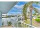 Balcony overlooking the water, with palm trees and boats in view at 300 Venetian Dr # 7, Clearwater, FL 33755