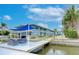 Private boat dock with seating area and waterfront access at 300 Venetian Dr # 7, Clearwater, FL 33755