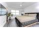 Spacious bedroom with large bed and walk-in closet at 300 Venetian Dr # 7, Clearwater, FL 33755