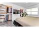 Main bedroom with large bed, walk-in closet, and TV at 300 Venetian Dr # 7, Clearwater, FL 33755