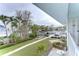 Stunning view of the canal and neighboring properties from a patio at 300 Venetian Dr # 7, Clearwater, FL 33755