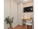 Small home office with a desk, chair and closet at 3116 Winchester Dr, Dunedin, FL 34698