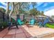 Inviting patio with fire pit and comfortable seating for relaxation at 3116 Winchester Dr, Dunedin, FL 34698