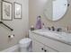 Well-appointed bathroom with granite countertop and modern fixtures at 4840 Grand Banks Dr, Wimauma, FL 33598