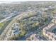 Aerial view showcasing property and its proximity to water and highway at 4918 Woodland Dr, St Petersburg, FL 33708