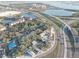Aerial view of property showing location near highway and water at 4918 Woodland Dr, St Petersburg, FL 33708