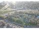 Aerial view of property and its surroundings at 4918 Woodland Dr, St Petersburg, FL 33708
