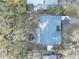 Aerial view showcasing home and pool at 4918 Woodland Dr, St Petersburg, FL 33708