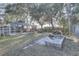 Spacious backyard with screened pool and fire pit at 4918 Woodland Dr, St Petersburg, FL 33708