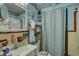 Clean bathroom with shower/tub combo and vanity at 4918 Woodland Dr, St Petersburg, FL 33708