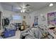 bedroom with a bed and various storage solutions at 4918 Woodland Dr, St Petersburg, FL 33708