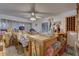 Dining area with wooden island and built-in shelving at 4918 Woodland Dr, St Petersburg, FL 33708