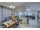 Kitchen with island and view into living room at 4918 Woodland Dr, St Petersburg, FL 33708