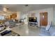 Spacious living room with gray couches and a TV at 4918 Woodland Dr, St Petersburg, FL 33708
