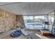 Pool area with an enclosed pool and grilling station at 4918 Woodland Dr, St Petersburg, FL 33708