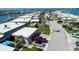 Aerial view of waterfront community with lush landscaping and private boat docks at 494 Boca Ciega Point N Blvd, St Petersburg, FL 33708