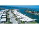 Aerial view of a waterfront community, showcasing the layout and landscaping at 494 Boca Ciega Point N Blvd, St Petersburg, FL 33708