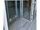 Bathroom under renovation with new tile flooring and exposed framing at 494 Boca Ciega Point N Blvd, St Petersburg, FL 33708