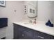Stylish navy blue vanity with white countertop at 494 Boca Ciega Point N Blvd, St Petersburg, FL 33708