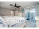 Bedroom with two beds and access to a patio at 494 Boca Ciega Point N Blvd, St Petersburg, FL 33708