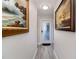 Bright entryway with tiled floor and framed artwork at 494 Boca Ciega Point N Blvd, St Petersburg, FL 33708
