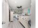 Two twin beds in a bright and airy guest bedroom at 494 Boca Ciega Point N Blvd, St Petersburg, FL 33708