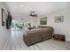 Open living room with sectional sofa and water view at 494 Boca Ciega Point N Blvd, St Petersburg, FL 33708