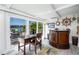 Home office with water views and built-in bar at 494 Boca Ciega Point N Blvd, St Petersburg, FL 33708