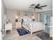 Spacious Primary bedroom with white bedroom suite at 494 Boca Ciega Point N Blvd, St Petersburg, FL 33708