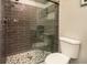 Large walk-in shower with gray tile surround at 494 Boca Ciega Point N Blvd, St Petersburg, FL 33708
