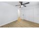 Spacious bedroom with ample closet space and ceiling fan at 5718 Magnolia N St, St Petersburg, FL 33703