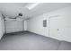 Attached garage with ample space and overhead storage at 5718 Magnolia N St, St Petersburg, FL 33703