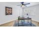 Serene home office featuring a desk, chair, and large Buddha painting at 5718 Magnolia N St, St Petersburg, FL 33703
