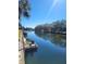 Peaceful waterfront view showcasing canal with docked boats at 6301 Newtown Cir # 1B1, Tampa, FL 33615